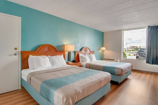 Foto van 2 tweepersoonsbedden | Nsmk, minikoelkast - Vakantiehuis in Clarion - BedRoom