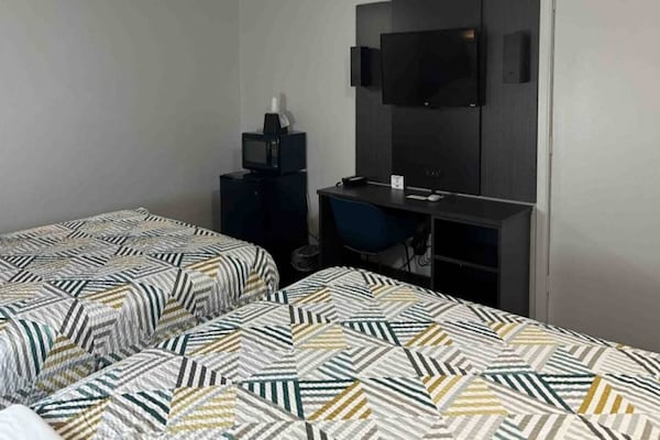 Foto van 2 tweepersoonsbedden | Niet-roken, koelkast - Vakantiehuis in Artesia - BedRoom
