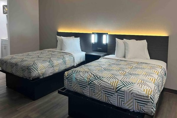 Foto van 2 tweepersoonsbedden | Niet-roken, koelkast - Vakantiehuis in Artesia - BedRoom