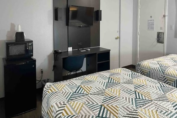 Foto van 2 tweepersoonsbedden (queensize) Rookvrije keuken - Vakantiehuis in Artesia - BedRoom