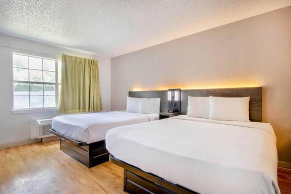 Foto van 2 tweepersoonsbedden, rokersgedeelte | San Antonio - BedRoom