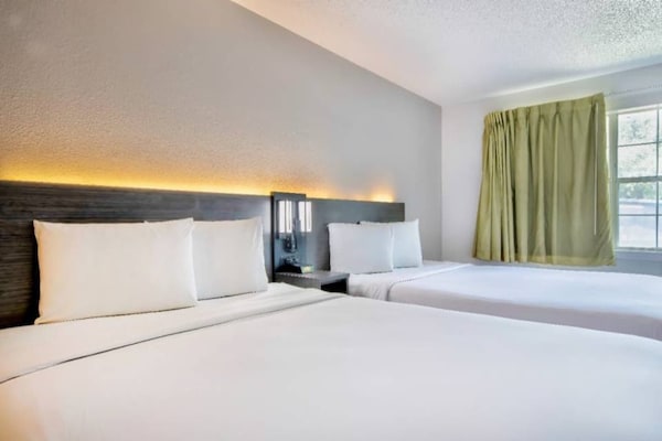 Foto van 2 tweepersoonsbedden, rokersgedeelte | San Antonio - BedRoom
