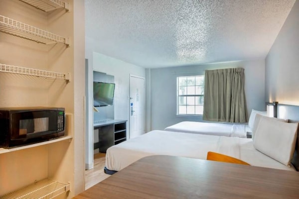 Foto van 2 tweepersoonsbedden, rokersgedeelte | San Antonio - BedRoom