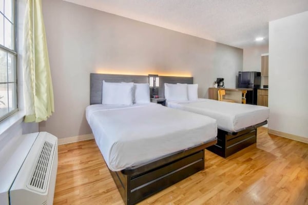 Foto van 2 tweepersoonsbedden | rookvrij - Vakantiehuis in San-Antonio - BedRoom