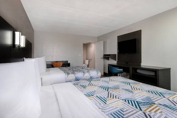 Foto van 2 tweepersoonsbedden | Rookvrij, Keuken - Vakantiehuis in San-Antonio - BedRoom