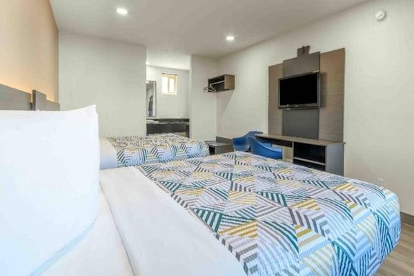 Foto van 2 tweepersoonsbedden (queensize) | Roken toegestaan - BedRoom