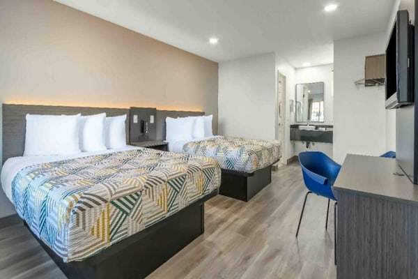 Foto van 2 tweepersoonsbedden (queensize) | Roken toegestaan - BedRoom