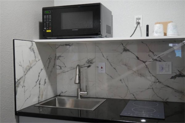 Foto van 1 tweepersoonsbed (queensize) | NS | Keuken - Vakantiehuis in Tacoma - BedRoom