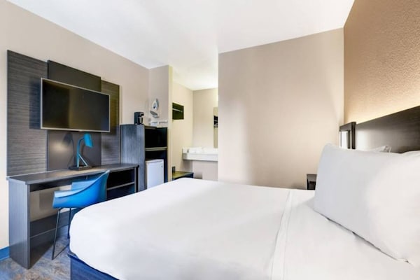 Foto van 1 tweepersoonsbed | Premium minikoelkast - Vakantiehuis in Kirkland - BedRoom