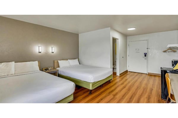 Foto van 2 tweepersoonsbedden | Rookvrij - Vakantiehuis in Ogden - BedRoom