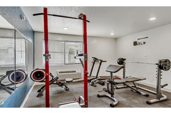 Foto van 2 tweepersoonsbedden | Toegankelijk voor - Vakantiehuis in Ogden - gym