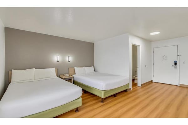 Foto van 2 tweepersoonsbedden | Toegankelijk voor - Vakantiehuis in Ogden - BedRoom