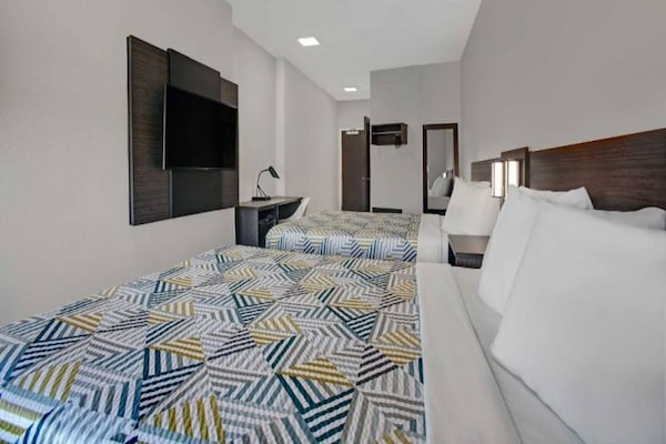Foto van 2 tweepersoonsbedden | Nsmk, keuken - Vakantiehuis in Monahans - BedRoom