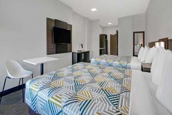 Foto van 2 tweepersoonsbedden | Nsmk, keuken - Vakantiehuis in Monahans - BedRoom