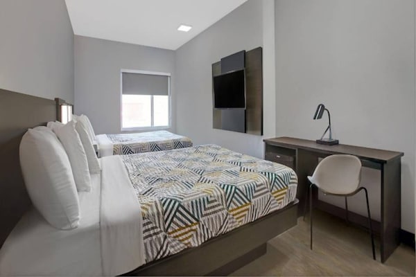 Foto van 2 tweepersoonsbedden | Nsmk, keuken - Vakantiehuis in Monahans - BedRoom