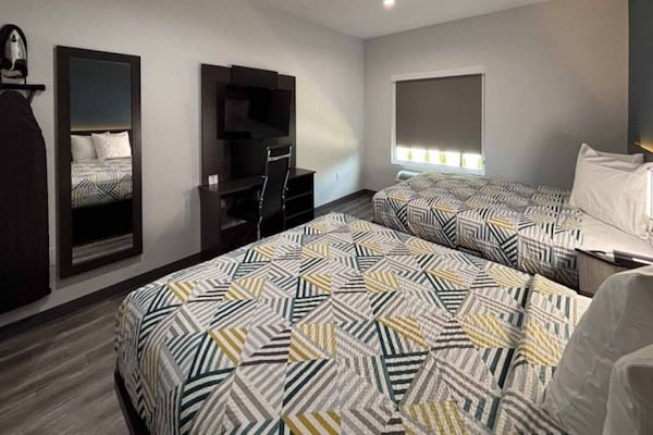 Foto van 2 tweepersoonsbedden | Rookvrij, Keuken - Vakantiehuis in Dallas - BedRoom