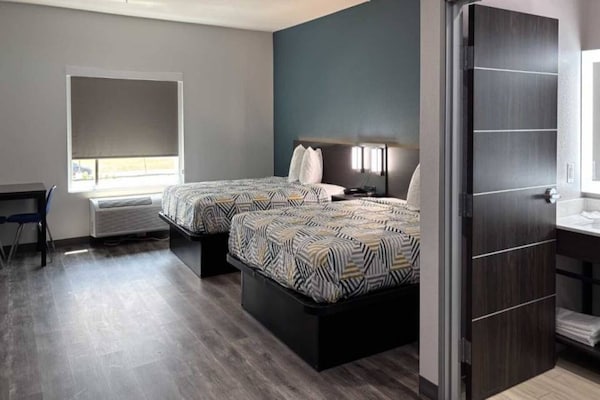 Foto van 2 tweepersoonsbedden | Rookvrij, Keuken - Vakantiehuis in Dallas - BedRoom