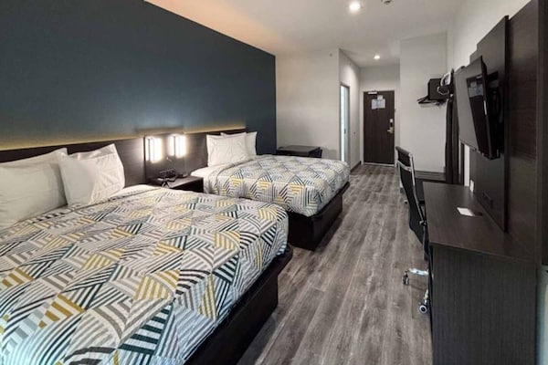 Foto van 2 tweepersoonsbedden | Rookvrij, Keuken - Vakantiehuis in Dallas - BedRoom