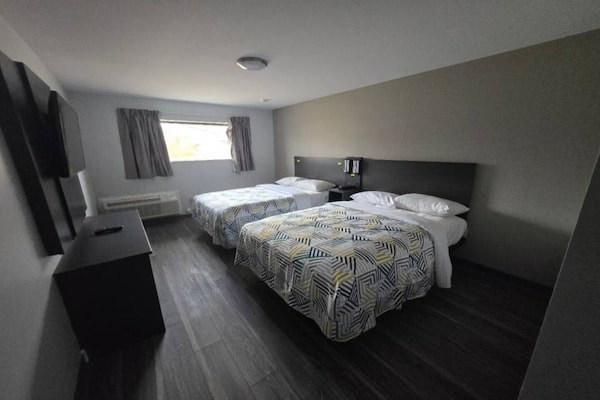 Foto van 2 Queensize Bedden | Ns | Keuken - Vakantiehuis in East Windsor - BedRoom
