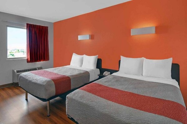 Foto van 2 Queensize Bedden | Premium | Micfridge - Vakantiehuis in Cutler Bay - BedRoom