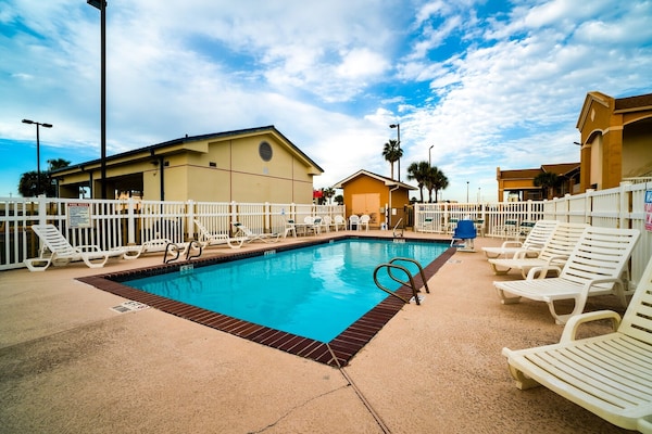 Foto van 2 tweepersoonsbedden (queensize) | Rookvrij - Vakantiehuis in Galveston TX - Pool