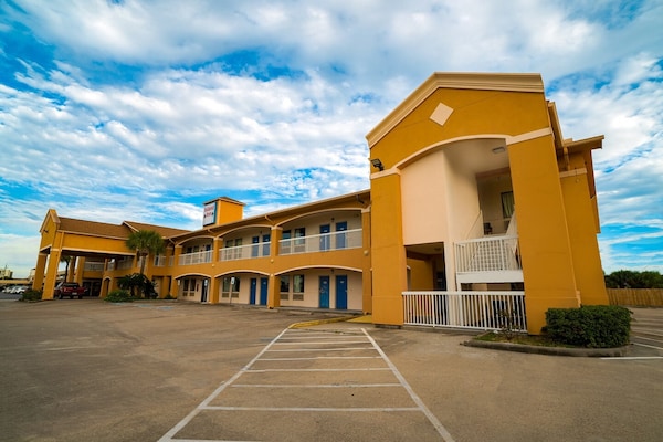Foto van 2 tweepersoonsbedden (queensize) | Rookvrij - Vakantiehuis in Galveston TX - parking