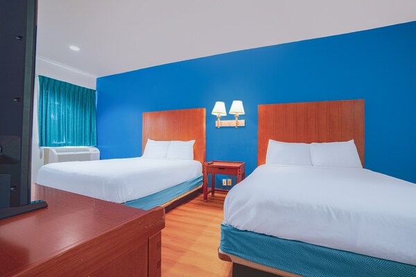Foto van 2 tweepersoonsbedden (queensize) | Rookvrij - Vakantiehuis in Galveston TX - BedRoom
