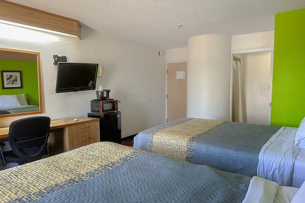 Foto van 2 tweepersoonsbedden | Rookvrij - Vakantiehuis in Memphis - BedRoom