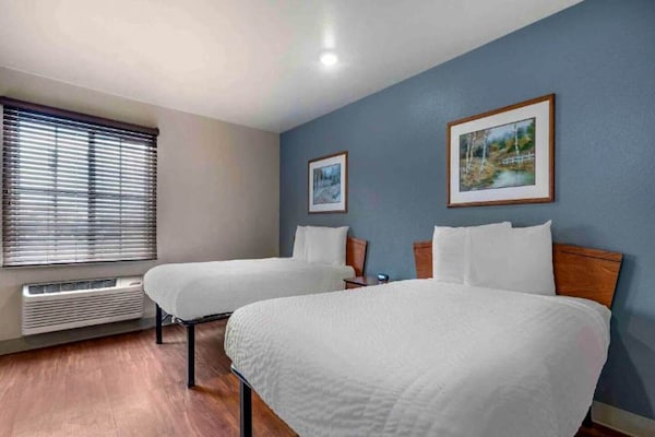 Foto van 2 Tweepersoonsbedden | Roken, Keuken - Vakantiehuis in Bossier City - BedRoom