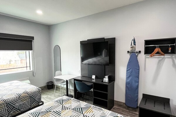 Foto van 2 tweepersoonsbedden | Rookvrij, Keuken - Vakantiehuis in Houston - BedRoom