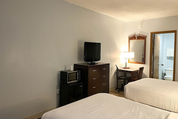 Foto van 2 tweepersoonsbedden | Niet-roken, koelkast - Vakantiehuis in Tiffin - BedRoom