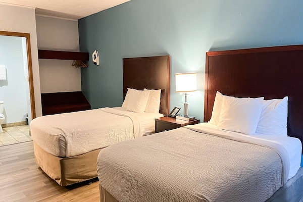 Foto van 2 tweepersoonsbedden | Niet-roken, koelkast - Vakantiehuis in Tiffin - BedRoom