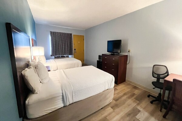 Foto van 2 tweepersoonsbedden | Niet-roken, koelkast - Vakantiehuis in Tiffin - BedRoom