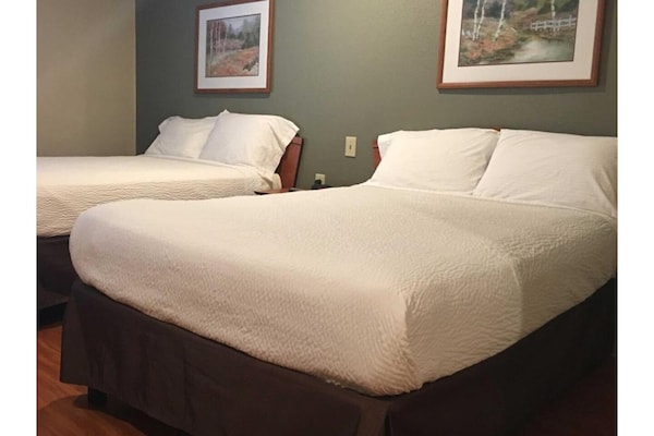 Foto van 2 tweepersoonsbedden | Rookvrij, Keuken - Vakantiehuis in Pelham AL - BedRoom