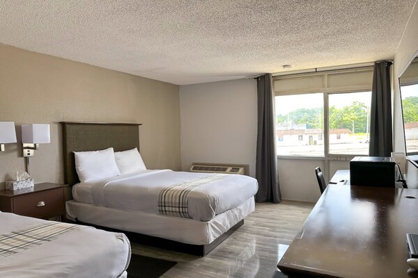 Foto van 2 tweepersoonsbedden | Niet-roken, koelkast - Vakantiehuis in Rochester NY - BedRoom