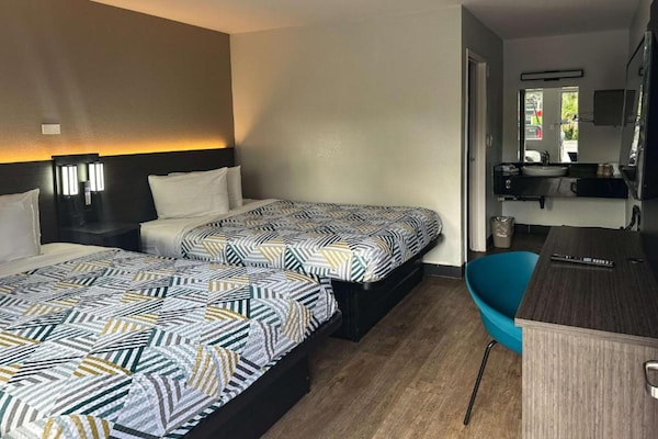 Foto van 2 tweepersoonsbedden | Premium minikoelkast - Vakantiehuis in Kissimmee - BedRoom