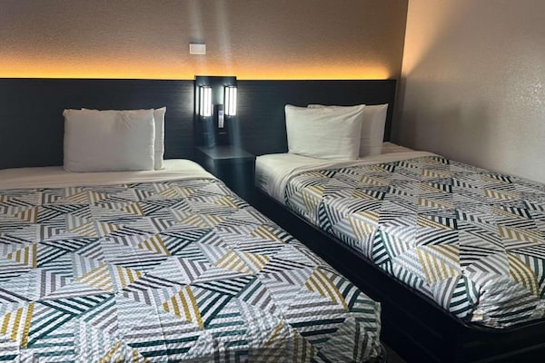 Foto van 2 tweepersoonsbedden | Premium minikoelkast - Vakantiehuis in Kissimmee - BedRoom