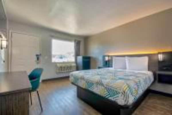Foto van 1 tweepersoonsbed | Rolstoeltoegankelijke/RI-douche - BedRoom