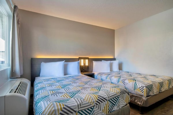 Foto van 2 tweepersoonsbedden | Roken toegestaan - Vakantiehuis in Santa Fe - BedRoom