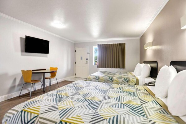 Foto van 2 tweepersoonsbedden (queensize) | Rookvrij - Vakantiehuis in Lodi - BedRoom